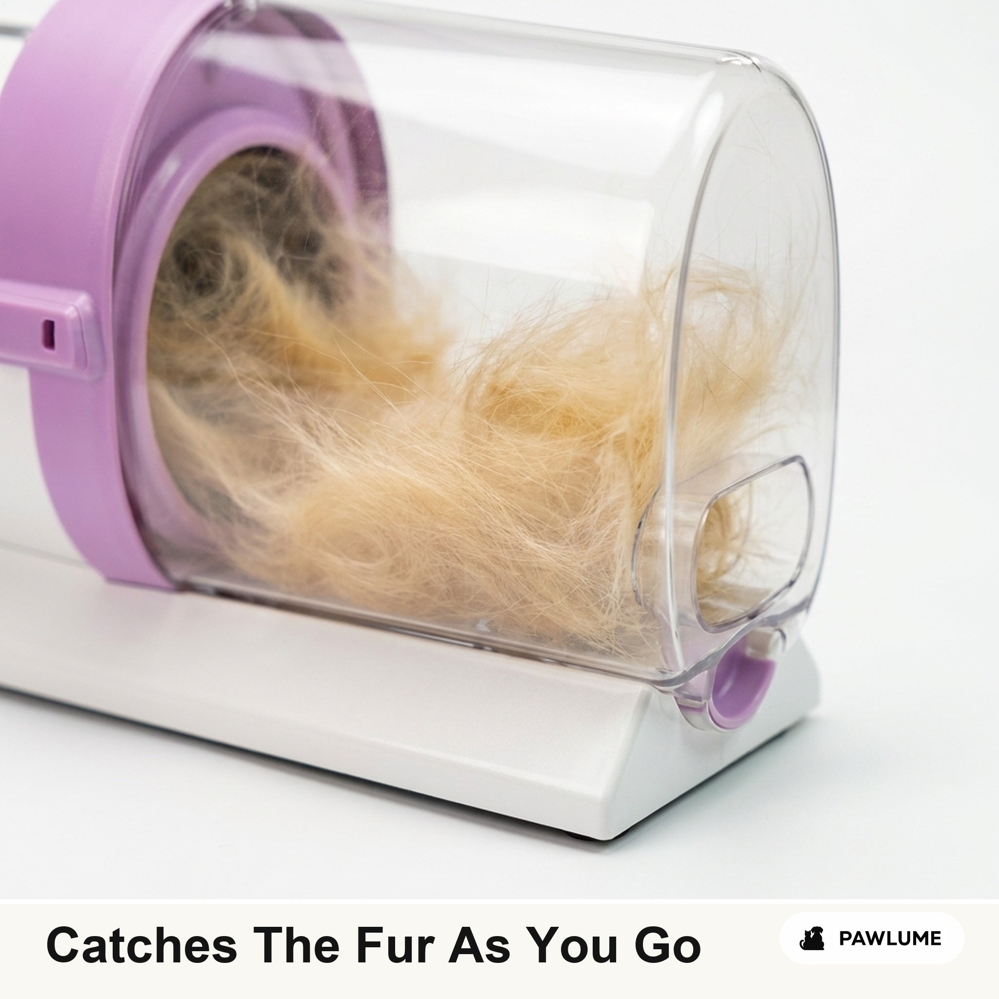 Clear canister catching loose fur during grooming